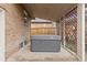 Private hot tub on covered patio provides a luxurious spot for relaxation and unwinding after a long day at 3649 N Garfield St, Denver, CO 80205