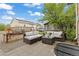 Outdoor patio with comfortable seating and lush greenery offers a relaxing space for entertaining guests at 3649 N Garfield St, Denver, CO 80205