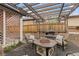 Cozy outdoor space with a pergola, seating, and fire pit perfect for relaxing and enjoying evenings with guests at 3649 N Garfield St, Denver, CO 80205