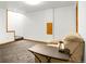 Finished basement features new carpet and a cozy couch at 12414 Clayton Way, Thornton, CO 80241