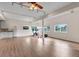 Spacious basement area with laminate flooring, multiple windows, and a kitchenette at 730 Summerwood Dr, Golden, CO 80401