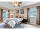 Cozy bedroom with a comfortable bed, neutral decor, and good natural lighting at 730 Summerwood Dr, Golden, CO 80401