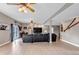 Expansive living room with light floors, modern fixtures, and abundant natural light at 730 Summerwood Dr, Golden, CO 80401