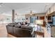 Open living room area with modern decor, comfortable seating, and a full walkout at 730 Summerwood Dr, Golden, CO 80401