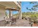 Inviting outdoor patio features a dining area with an umbrella and scenic views of the surrounding landscape at 730 Summerwood Dr, Golden, CO 80401