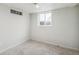 Finished basement bedroom with new carpeting, a window, and neutral-toned walls at 3540 E 91St Ave, Thornton, CO 80229