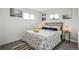 Cozy bedroom with hardwood floors, bright natural light and modern décor at 3540 E 91St Ave, Thornton, CO 80229