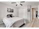 Well lit bedroom featuring light grey walls, carpet, and a closet at 487 Oxbow Dr, Brighton, CO 80601