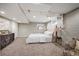 Basement bedroom featuring a large closet, soft carpet, and white painted brick at 1532 Meade St, Denver, CO 80204