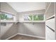 A well-lit walk-in closet with built-in shelving and organization system at 1532 Meade St, Denver, CO 80204