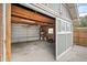 Attached garage featuring ample storage and workspace, a functional addition to the property at 1532 Meade St, Denver, CO 80204