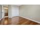 Bedroom with hardwood floors and closet with sliding doors at 4214 Kestrel Pl, Castle Rock, CO 80109