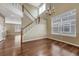 This space boasts hardwood floors, a statement staircase, and lots of windows for natural light at 4214 Kestrel Pl, Castle Rock, CO 80109