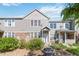 Charming townhome featuring stone accents, neutral siding, and well-maintained landscaping, creating a welcoming curb appeal at 12766 Jasmine St # D, Thornton, CO 80602