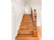 Beautiful wooden staircase with detailed carvings and natural lighting at 506 N Marion St, Denver, CO 80218
