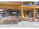 Cozy back deck offering a serene outdoor space to relax and enjoy nature at 6080 Kilimanjaro Dr, Evergreen, CO 80439