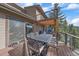 Outdoor deck featuring dining table and outdoor seating; a great space for entertaining guests at 6080 Kilimanjaro Dr, Evergreen, CO 80439