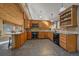 Spacious kitchen with wooden cabinets and modern appliances at 6080 Kilimanjaro Dr, Evergreen, CO 80439