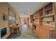 This eating area features a breakfast nook and built in display shelving at 6080 Kilimanjaro Dr, Evergreen, CO 80439