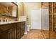 Elegant bathroom featuring a double sink vanity, sleek fixtures, and glass enclosed shower at 8552 Gold Peak Ln # F, Highlands Ranch, CO 80130