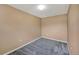 Unfurnished bedroom with carpet floors, neutral walls, and good natural light at 8552 Gold Peak Ln # F, Highlands Ranch, CO 80130