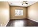 Bright bedroom with large window and hardwood floors, providing ample natural light at 8552 Gold Peak Ln # F, Highlands Ranch, CO 80130