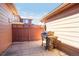 Outdoor patio area featuring a grill and privacy fence, perfect for entertaining at 8552 Gold Peak Ln # F, Highlands Ranch, CO 80130