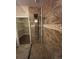 Modern walk-in shower with stylish tile work and spa-like shower head at 8552 Gold Peak Ln # F, Highlands Ranch, CO 80130