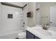 Bathroom vanity, toilet, shower with storage shelves at 16062 E Geddes Dr # 150, Aurora, CO 80016