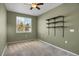 This bedroom features shelves and a window at 16062 E Geddes Dr # 150, Aurora, CO 80016