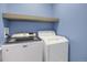 Laundry room with modern washer and dryer at 16062 E Geddes Dr # 150, Aurora, CO 80016