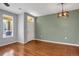 Spacious living room with hardwood flooring, neutral wall paint and stylish light fixtures at 16062 E Geddes Dr # 150, Aurora, CO 80016