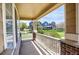 Exterior side porch with a clear view of the community's landscaped common area at 16062 E Geddes Dr # 150, Aurora, CO 80016