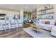 Open-concept living space featuring a kitchen, dining area, and comfortable living room at 14133 Deertrack Ln, Parker, CO 80134