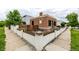 The backyard includes a patio area with outdoor seating, surrounded by tasteful fencing for privacy at 1803 E 36Th Ave, Denver, CO 80205