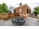 Outdoor patio features a bistro set, perfect for enjoying a peaceful backyard setting at 1803 E 36Th Ave, Denver, CO 80205