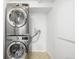Laundry area with stacked washer and dryer, and connections ready for immediate use at 1803 E 36Th Ave, Denver, CO 80205