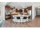 Gourmet kitchen with a large island, stainless steel appliances, and a breakfast bar, perfect for culinary enthusiasts at 6877 Northstar Ct, Castle Rock, CO 80108