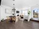 Spacious living area with hardwood floors, a cozy fireplace, and an open layout, great for both everyday living and hosting guests at 8711 E Hampden Ave # 20, Denver, CO 80231