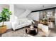 Bright living room features a comfortable sofa, stylish coffee table, and natural light, perfect for relaxing or entertaining at 8711 E Hampden Ave # 20, Denver, CO 80231
