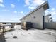 Exterior view of the rooftop deck with comfortable seating and dining in a modern style at 8711 E Hampden Ave # 20, Denver, CO 80231