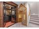 Finished basement with custom-built playhouse and stairs to upper level at 11702 Perry St, Westminster, CO 80031