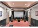 Home theater with large screen, surround sound system, and comfortable seating at 11702 Perry St, Westminster, CO 80031