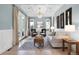 Bright living room with coffered ceilings, hardwood floors, and elegant decor at 11702 Perry St, Westminster, CO 80031