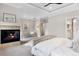 Main bedroom featuring a fireplace, recessed lighting, and neutral walls at 11702 Perry St, Westminster, CO 80031