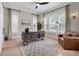 Bright and modern office space with large windows, hardwood floors, and stylish furniture at 11702 Perry St, Westminster, CO 80031
