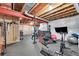 Spacious basement gym featuring workout equipment and rubber flooring for an ideal fitness space at 5388 Water Oak Cir, Castle Rock, CO 80108