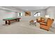 Relaxing game room with pool table, cozy seating, and warm lighting perfect for entertainment at 5388 Water Oak Cir, Castle Rock, CO 80108