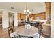 Spacious eat-in kitchen with custom cabinetry, granite countertops and stainless steel appliances at 5388 Water Oak Cir, Castle Rock, CO 80108