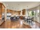 Bright eat-in kitchen featuring stainless steel appliances, custom cabinetry, and views of the yard at 5388 Water Oak Cir, Castle Rock, CO 80108